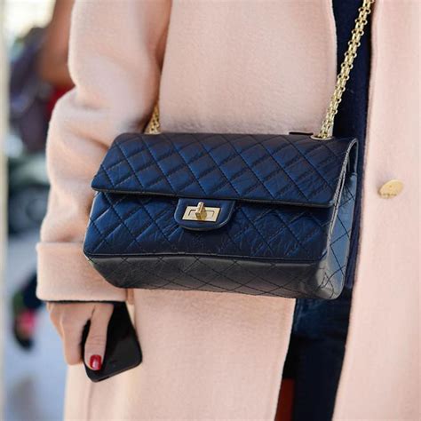 History and Facts About Classic Chanel 2.55 Bag .